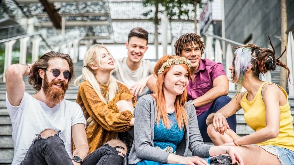 Group of friends meditating together Group of friends meditating together